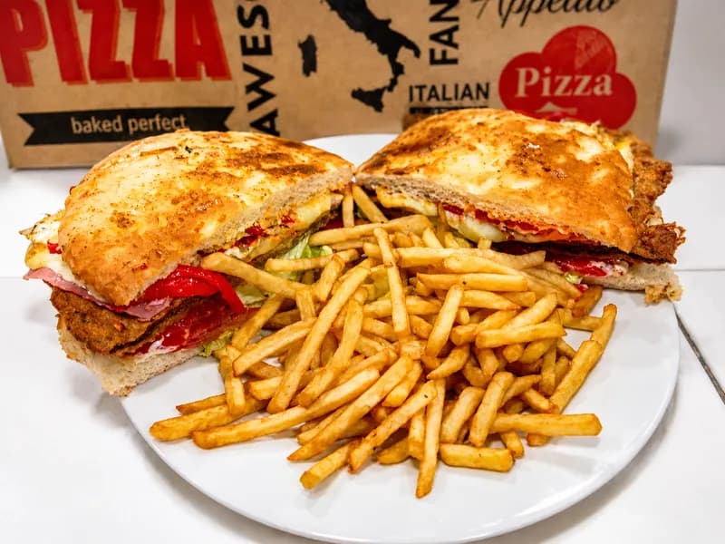 Milanesa gigante en pan de baurú